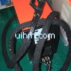 UM-20A-UHF with flexible handheld induction coil for jointing