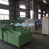 auto feeding system for induction forging steel rods (12)