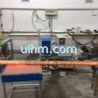 induction forging long steel rods